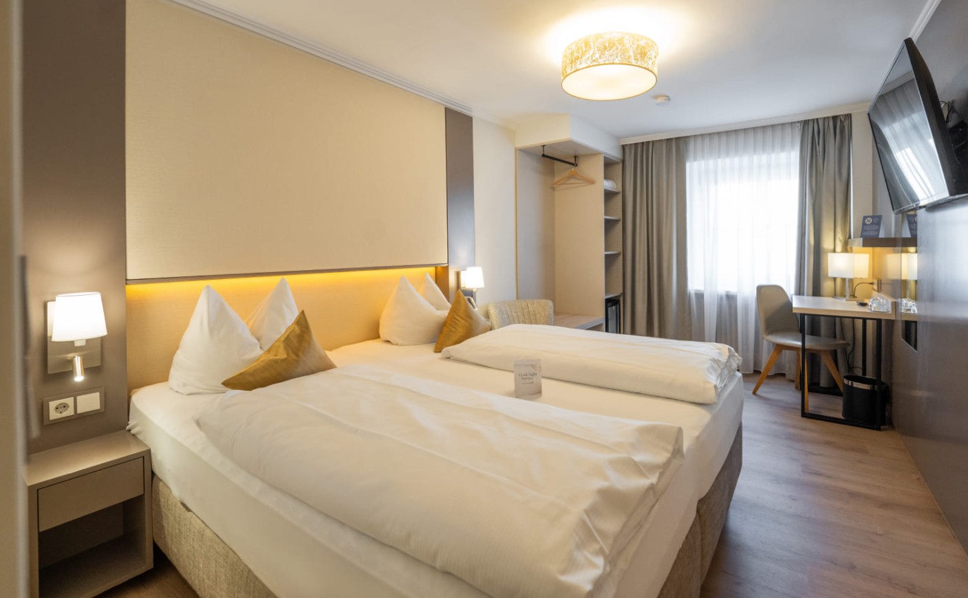 Komfortzimmer mit Sitzbereich im Hotel Trumer Stube