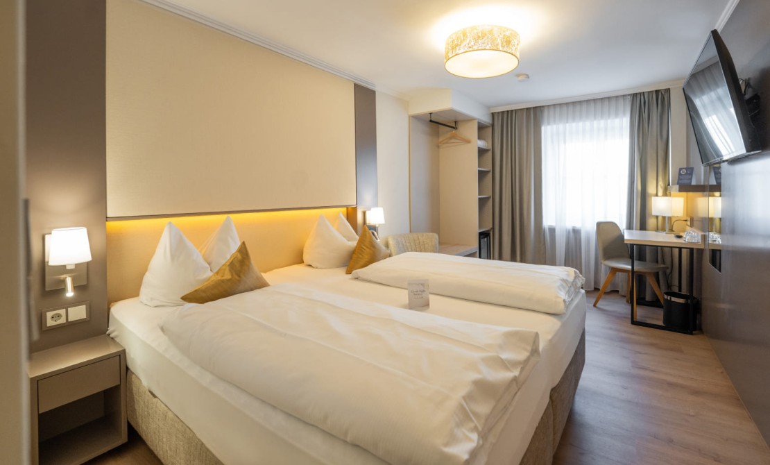 Komfortzimmer mit Sitzbereich im Hotel Trumer Stube